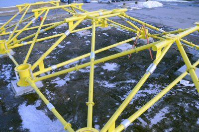 THE NEARLY 100-FOOT-LONG BASE SUPPORT FRAME for Ocean Renewable Power Company's first grid-connected, commercial TidGen Power System is being assembled by Perry Marine & Construction at its 