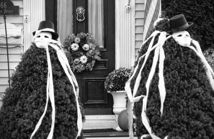 FOREST FRIGHTS flank the grounds outside this Eastport home, just before All Hallows' Eve. (Edward French photo)