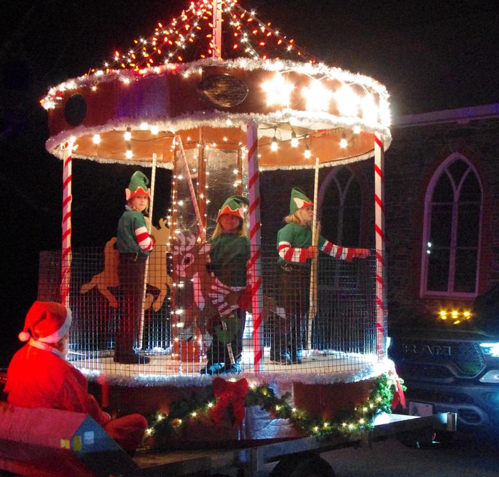 FIRST-PRIZE WINNER FOR FLOATS in the Grand Manan Christmas parade on November 28 was this holiday carousel entered by Sable Benson. (Arlene Benham photo)