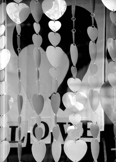 ALL YOU NEED IS LOVE. This Valentine's Day window display, spotted in an Eastport storefront, serves to brighten everyone's day. (Edward French photo)