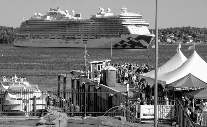 DOMINATING THE EASTPORT WATERFRONT on September 3 was the cruise ship Enchanted Princess, as guests lined the breakwater to depart on tenders to the vessel. (Edward French photo)