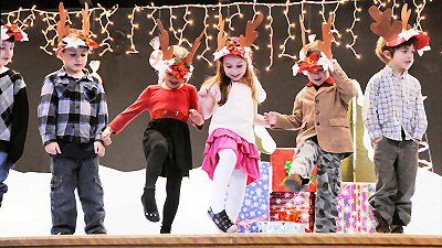 PERFORMING THE REINDEER PRANCE are K4 and K5 students during the Eastport Elementary School winter holiday concert on December 20. Along with performances by the various grades, the chorus a