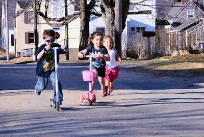 SPRING HAS SPRUNG! The warm weather the week of March 19 brought many outside to enjoy the sunshine, including Christian McPhail, 8, and Ella Perkins, 5, who try out their scooters on an Eas