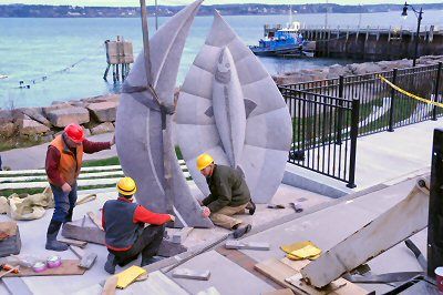 "NATURE'S GRACE," the new granite sculpture made by artist Jim Boyd of Hampton, N.B. (at right), is placed at Sutherland Overlook Park in Eastport on December 4. Eastport was one of the comm