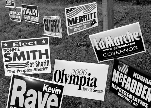 SIGNS OF THE TIMES. Campaign signs of all stripes dot the landscape this time of year. (Chessie Johnson photo) Area voters face full slate of candidates SIGNS OF THE TIMES. Campaign signs of