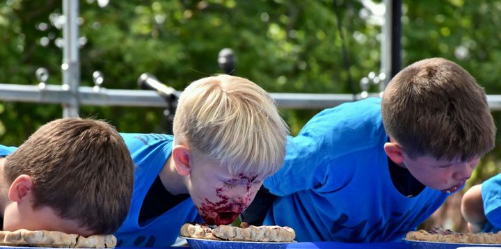 WHAT WOULD A WILD BLUEBERRY FESTIVAL be without the ever-popular blueberry pie-eating contest. This year's event in Machias drew a large crowd as many boys, girls and some adults tried their