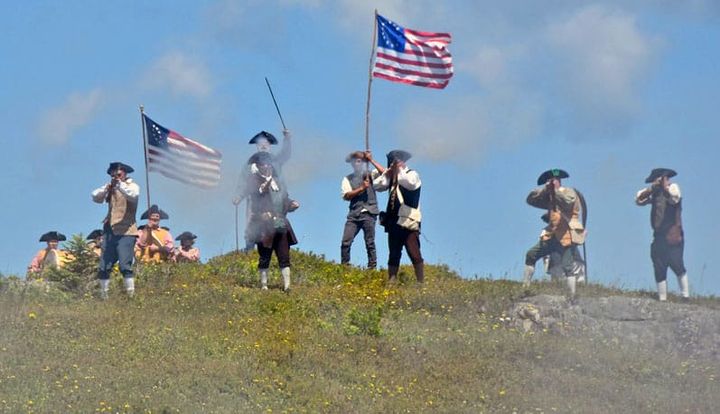 FIRING THEIR MUSKETS