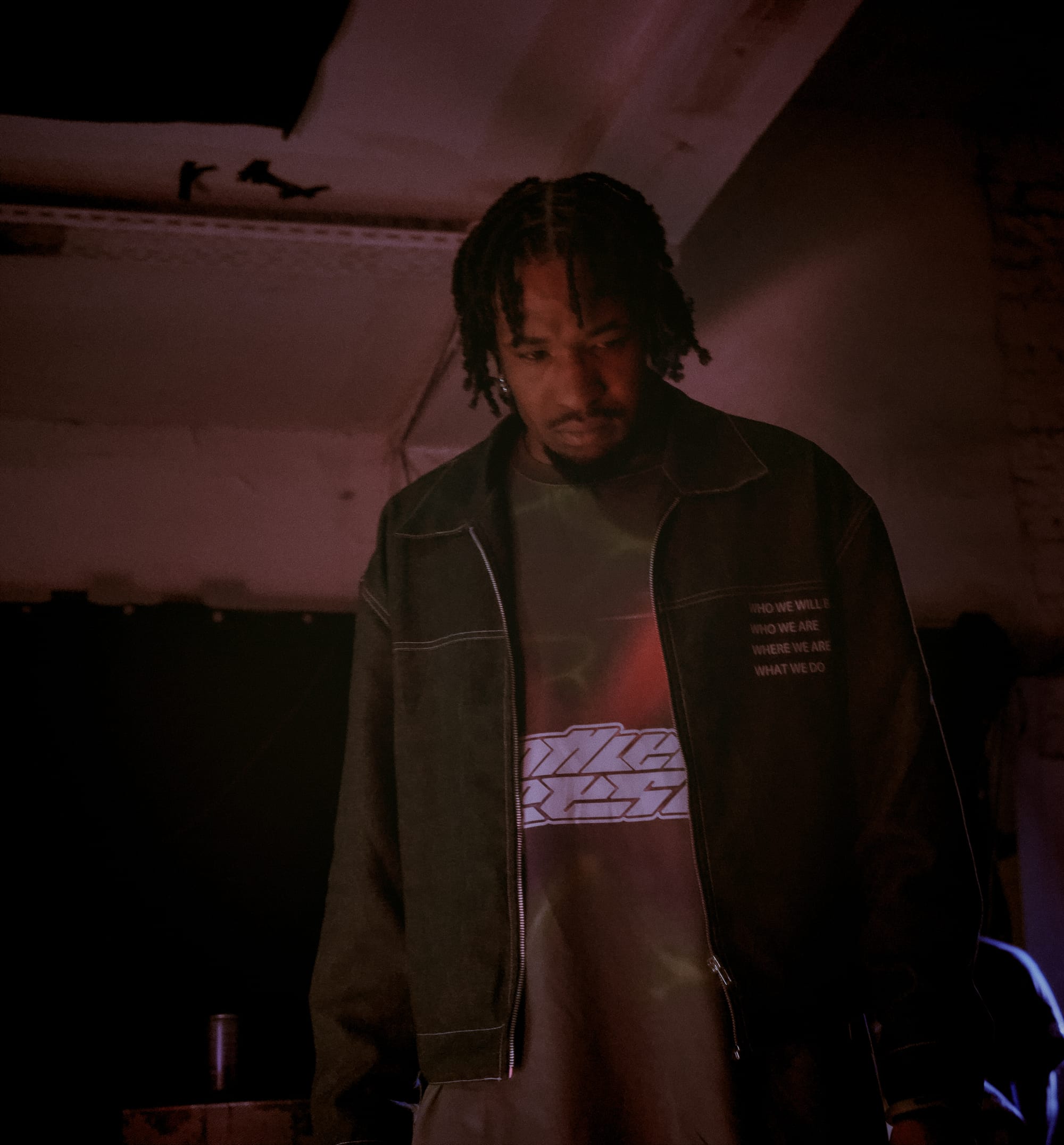 Kasha looks down, preparing for the battles.