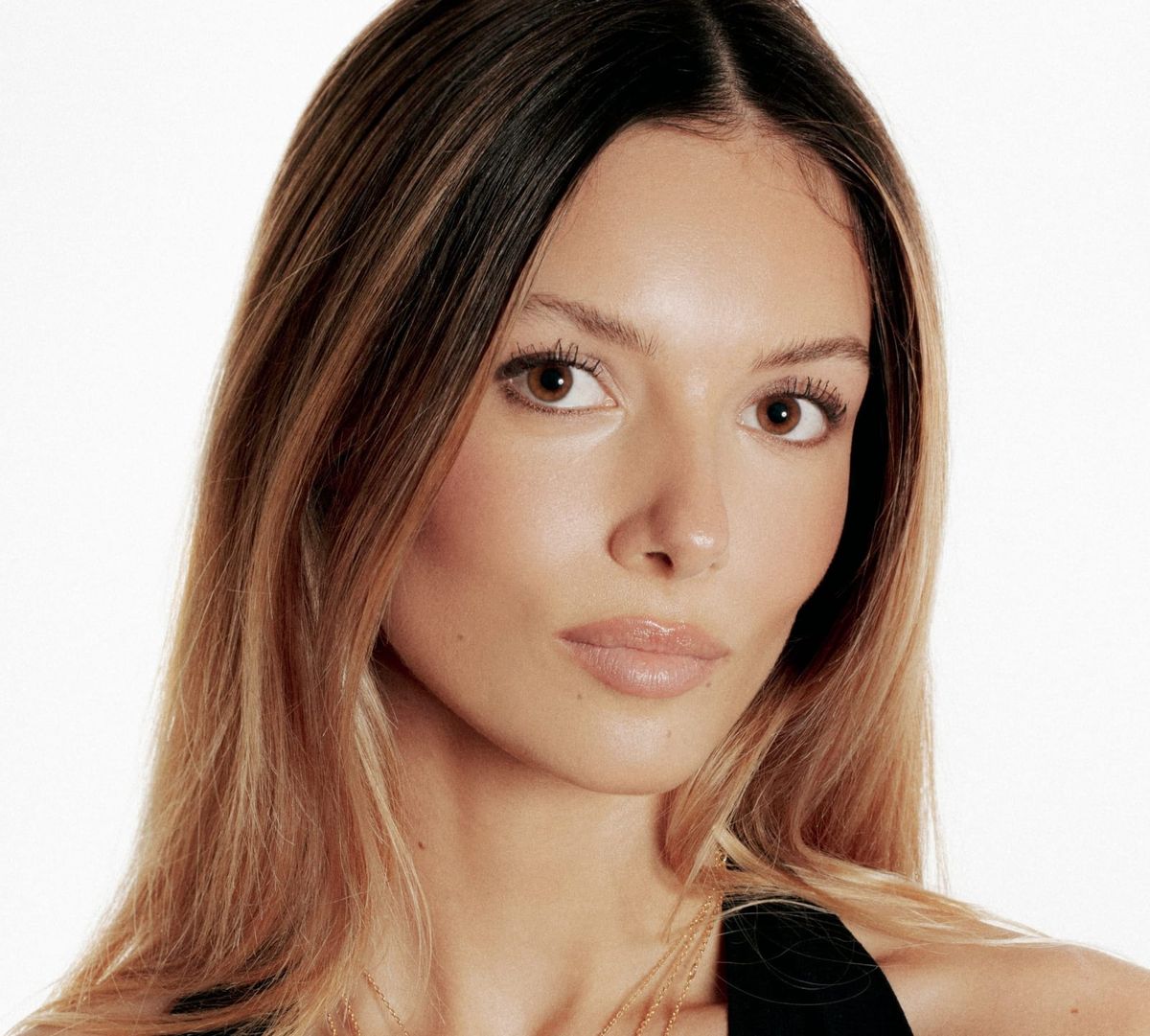 Portrait of Julia Carrier-Angel, author of Time Looks Marvelous on Her Wrist, a reflective essay on growing up around watches and discovering the beauty and emotion in horology.