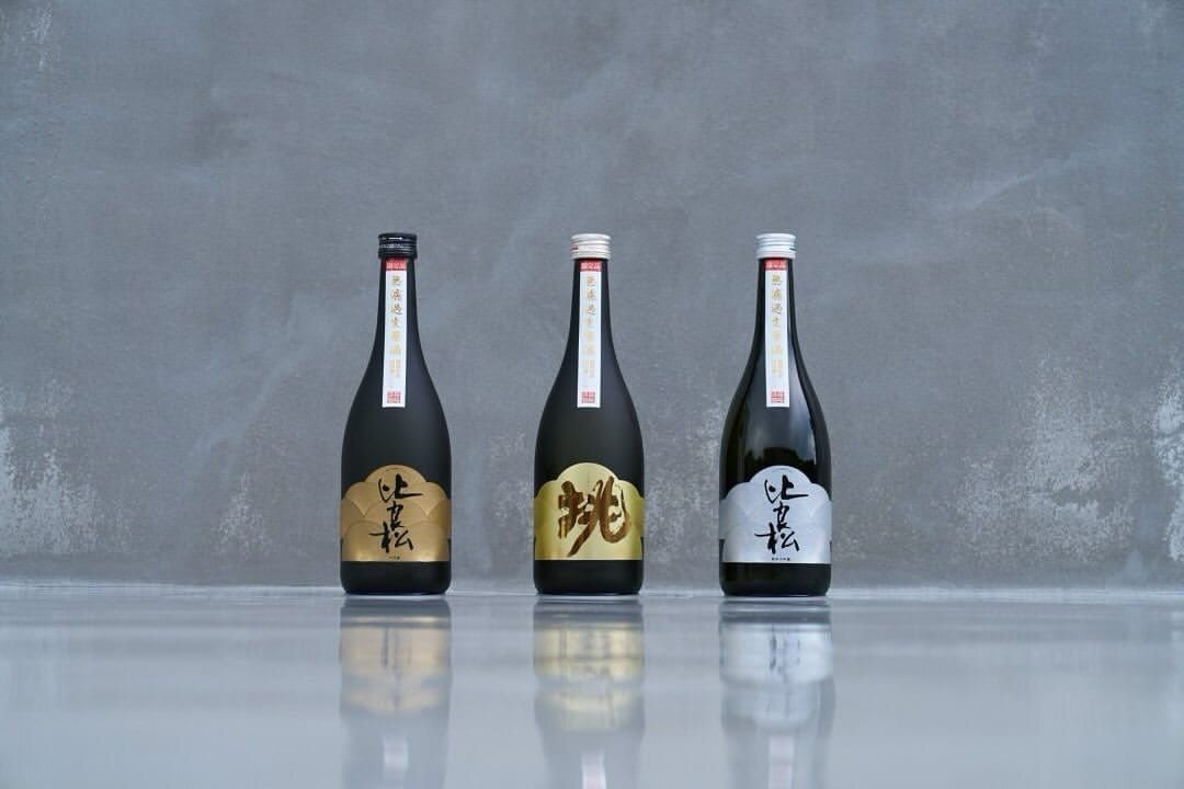 Three bottles from Shindo Distillery’s Experimental series displayed against a neutral backdrop in Japan.