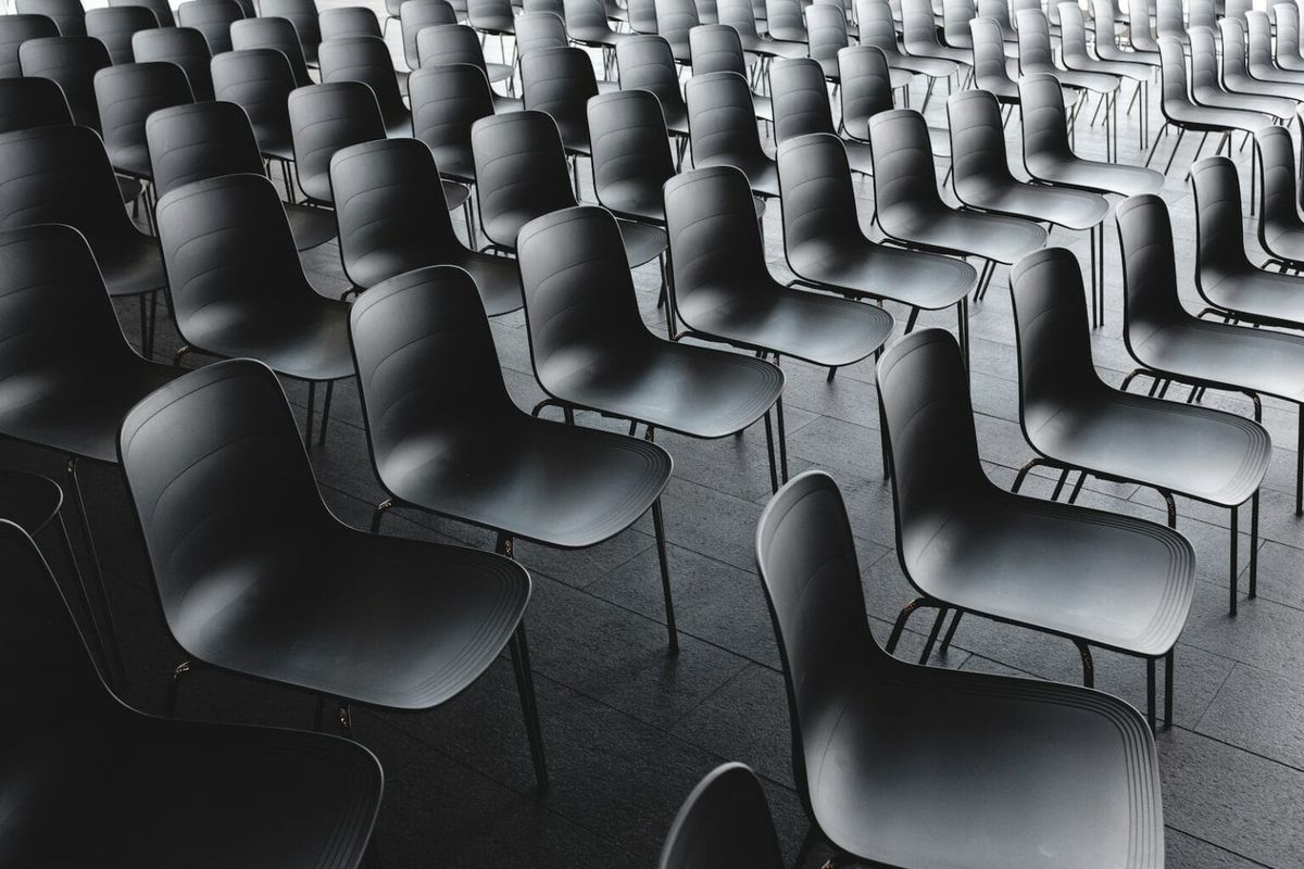 Rows of black chairs