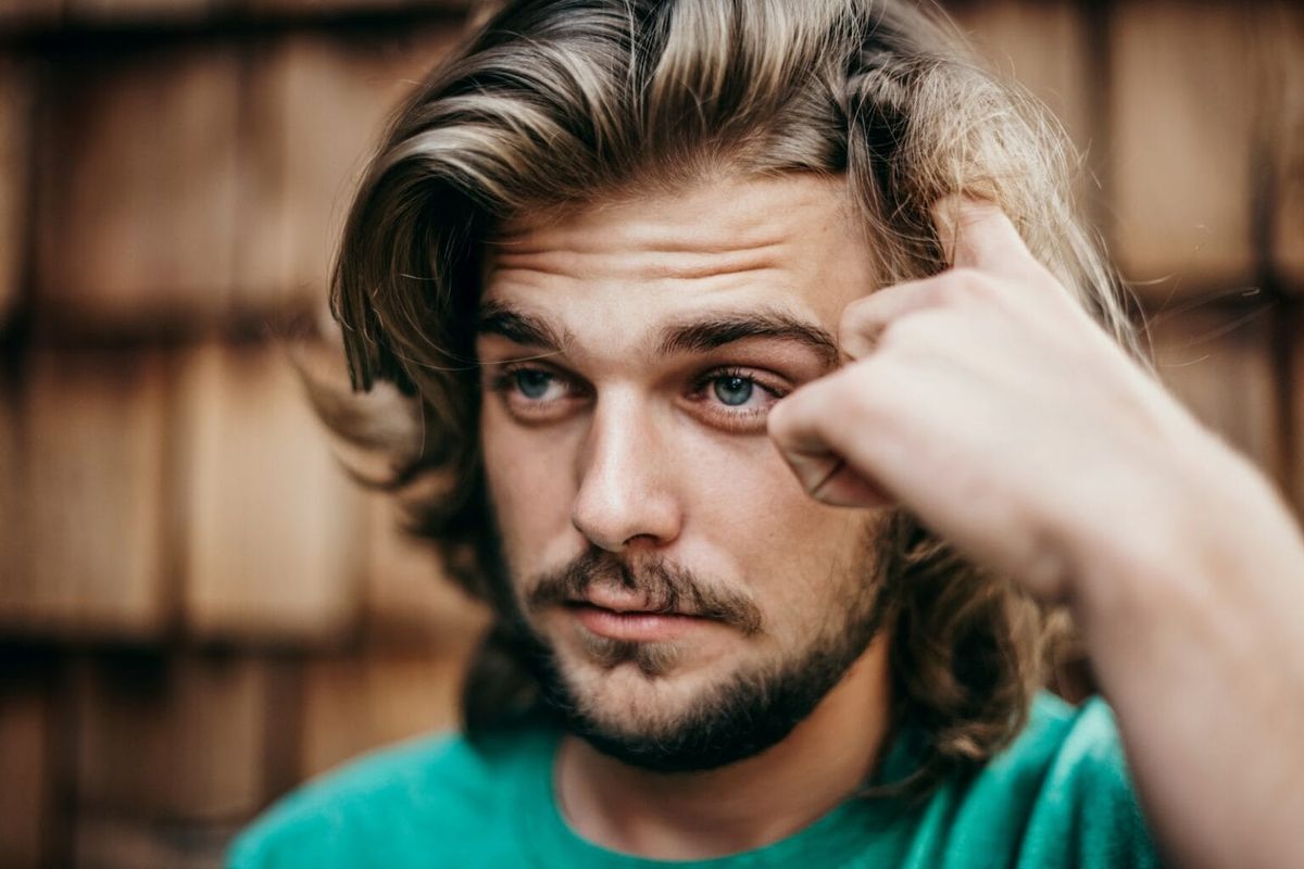 A man expressing deep thought — and maybe exhaustion