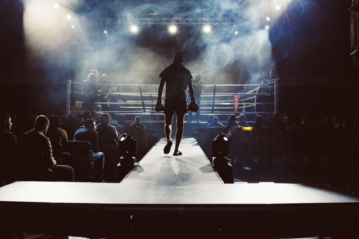 A shot of a boxer walking to the ring