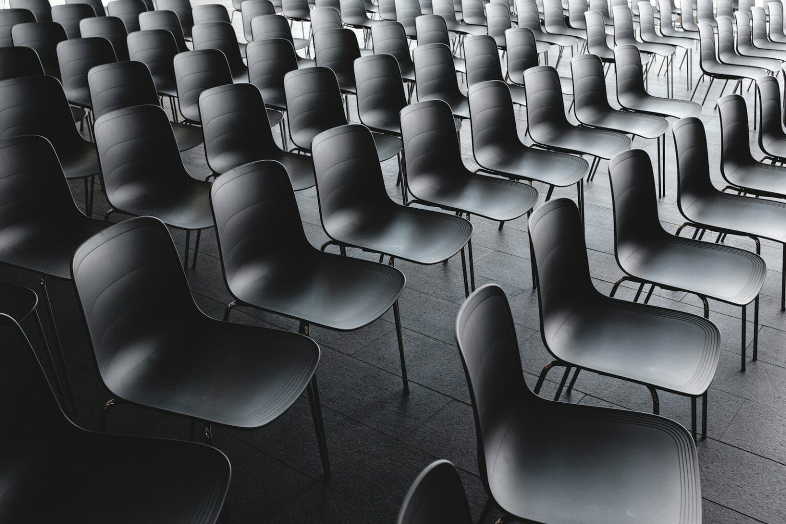 Rows of black chairs