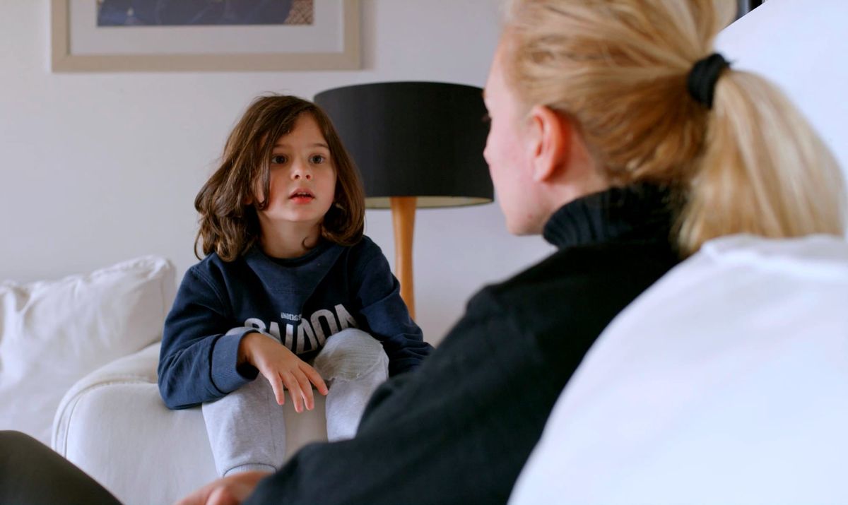 child talking to mother