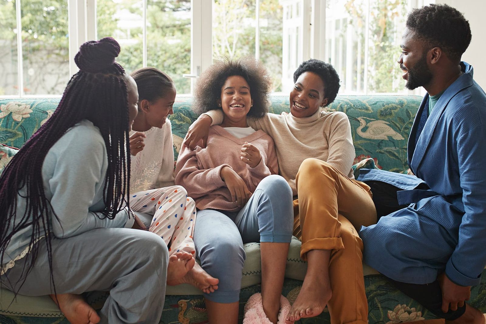 teenagers and family laughing together