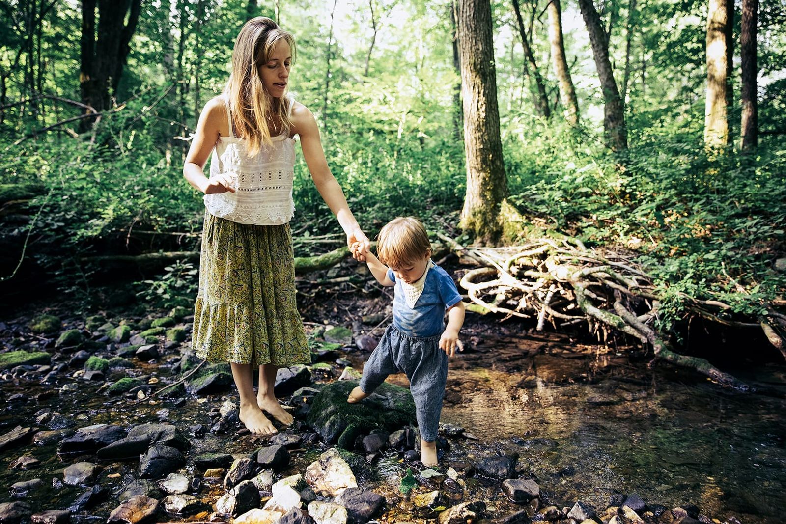 mother and child walking barefoot