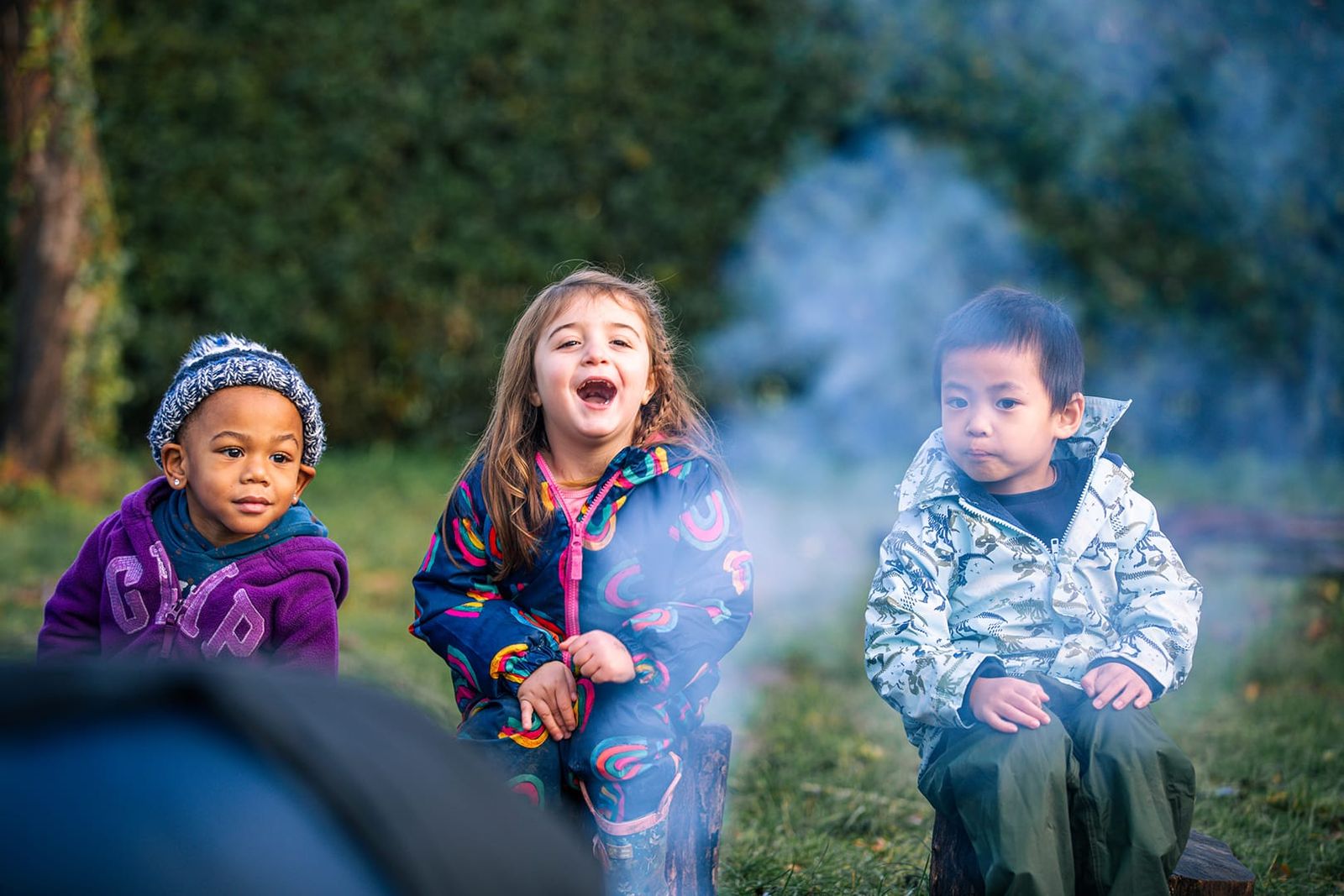children round a fire