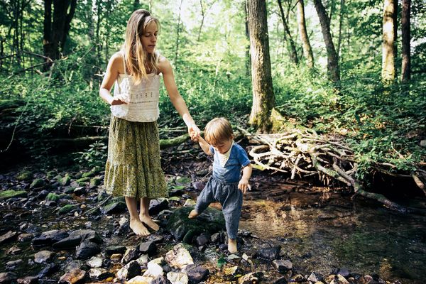 mother and child walking barefoot