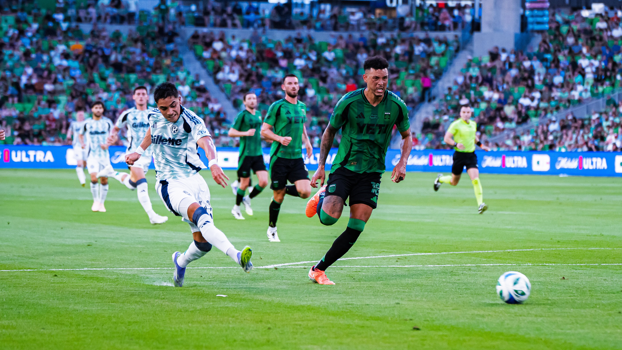 Luca Langoni getting past Julio Cascante for a shot