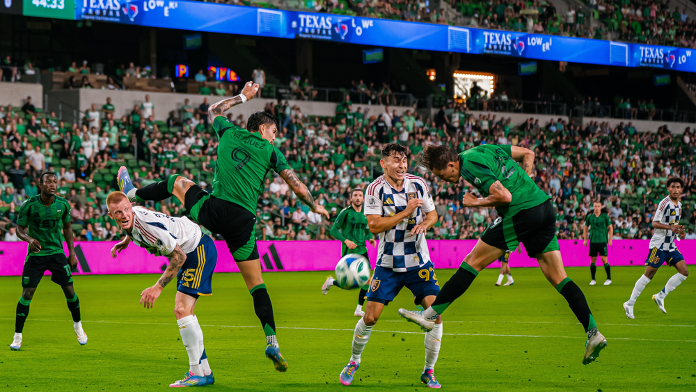 Austin FC and RSL players amid a loose ball
