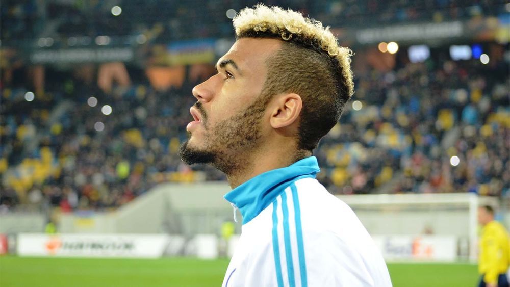 Eric Maxim Choupo-Moting, standing on the sidelines before a Schalke match