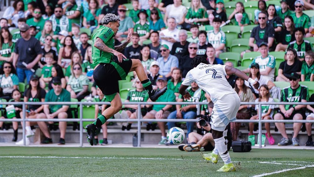 Dani Pereira leaping with one leg up like Captain Morgan in match vs. San Diego FC