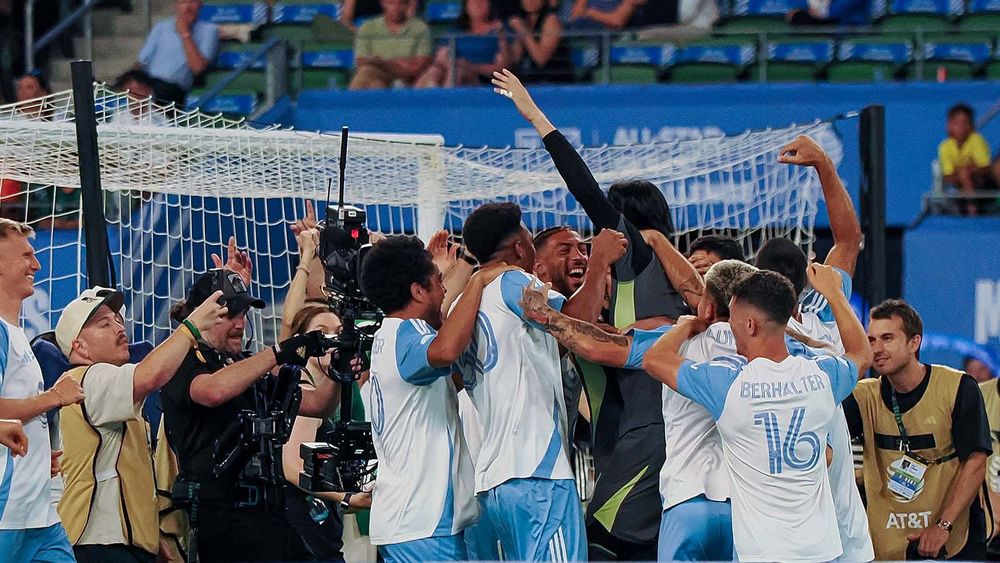 Yohei Takoaka mobbed by teammates after his winning kick in the 2025 All-Stars Skills Challenge