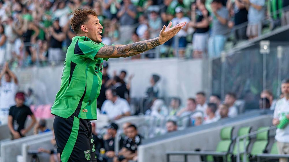 Austin FC fullback Guilherme Biro celebrating in front of home fans