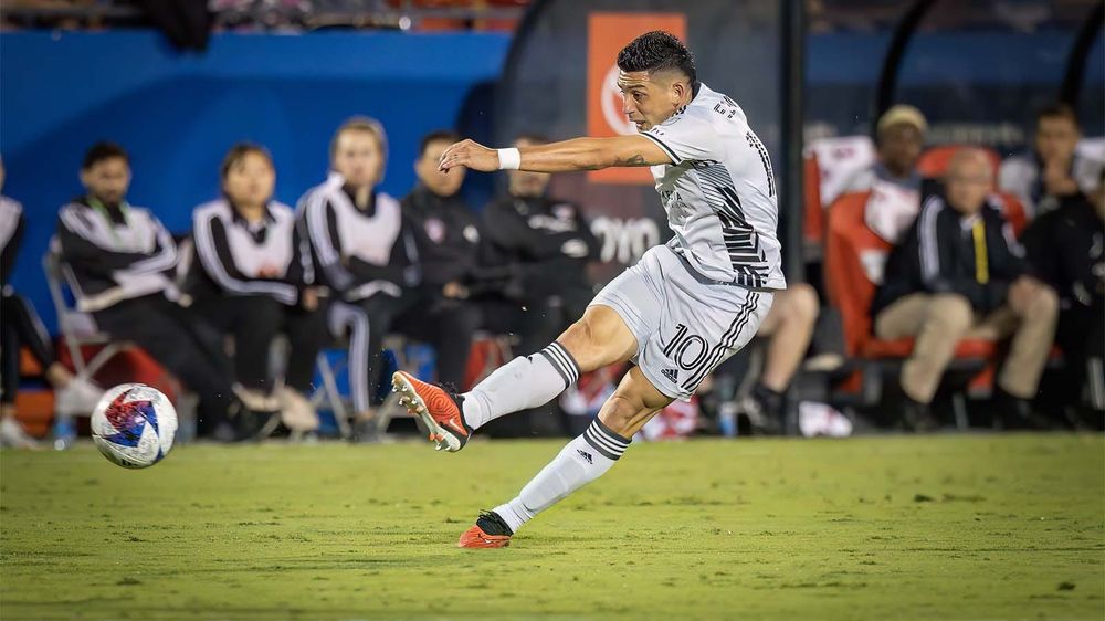 Cristian Espinoza of San Jose Earthquakes kicking ball