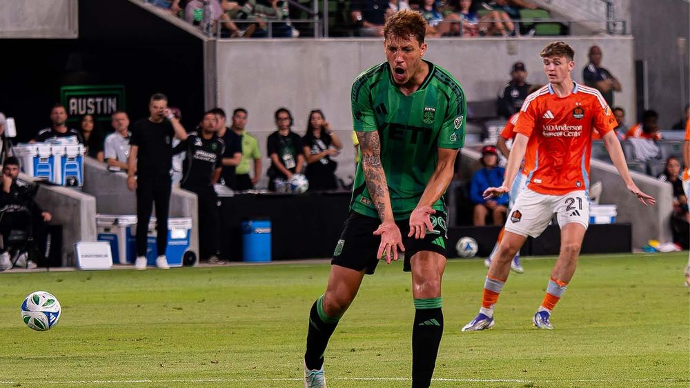 Guilherme Biro, frustrated in a match against Houston (with Houston's Jack McGlynn behind him)