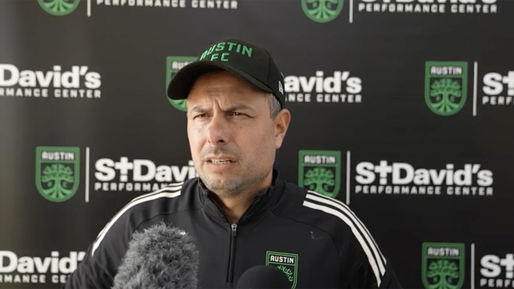 Austin FC head coach Nico Estévez answering questions from media