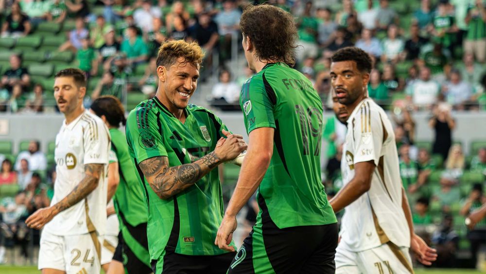 Guilherme Biro and CJ Fodrey of Austin FC celebrating a goal against LAFC