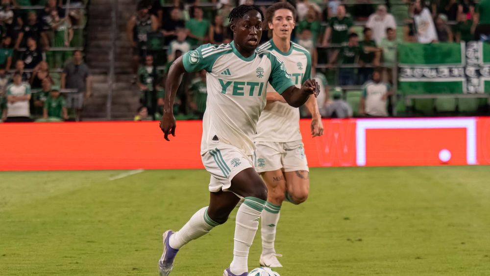 Osman Bukari running alongside CJ Fodrey