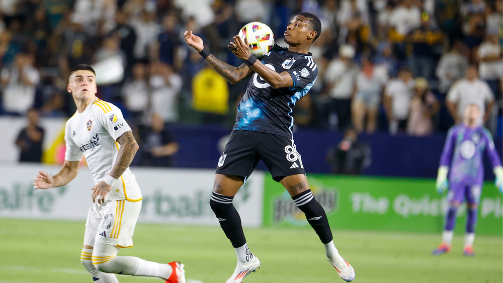 Joseph Rosales with Minnesota United in 2024, chesting a ball while playing against LA Galaxy