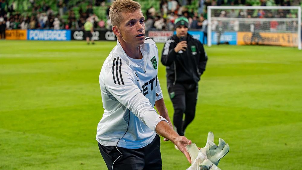 Stefan Cleveland throwing glove to fan after Austin FC's playoff exit loss to LAF