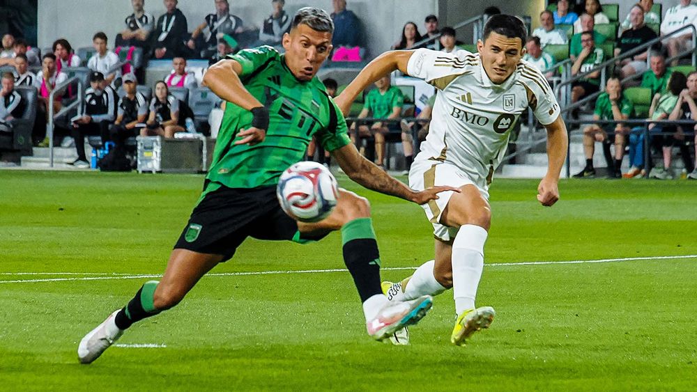 Austin FC's Myrto Uzuni trying to get past an LAFC defender