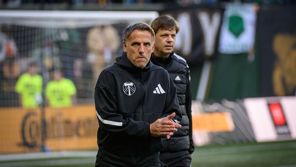 Phil Neville coaching with the Timbers