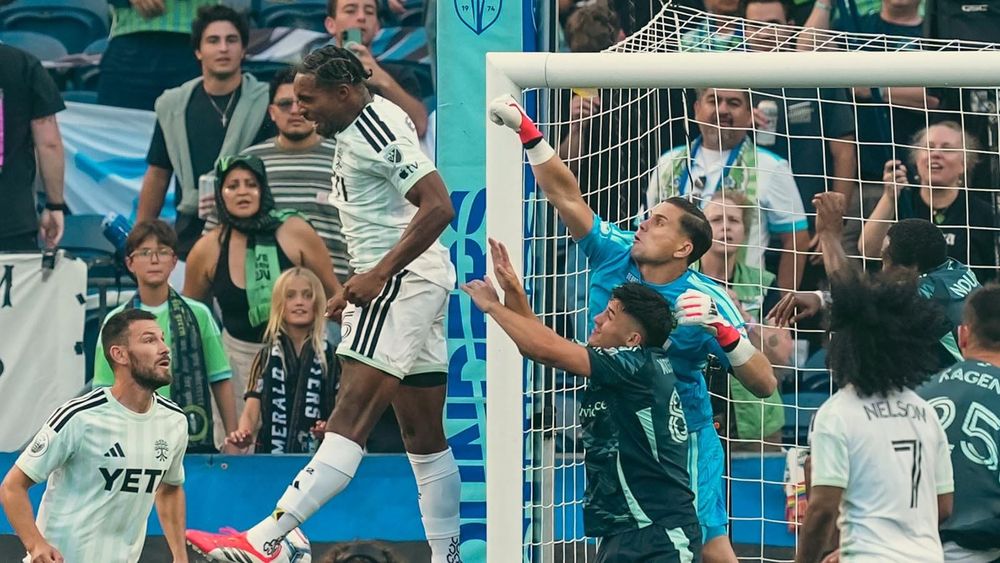 Austin FC and Seattle Sounders FC players battling in front of goal