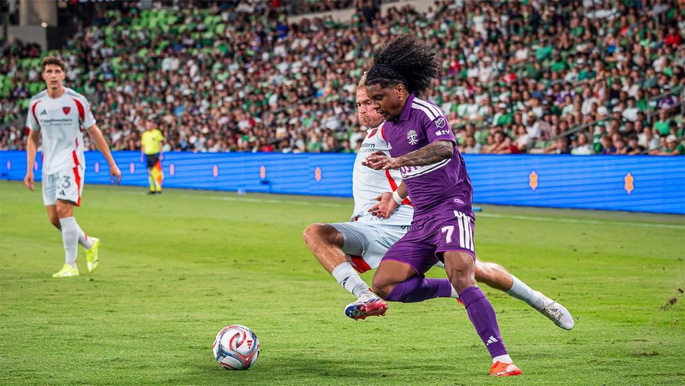 Jayden Nelson of Austin FC trying to get around an FC Dallas player