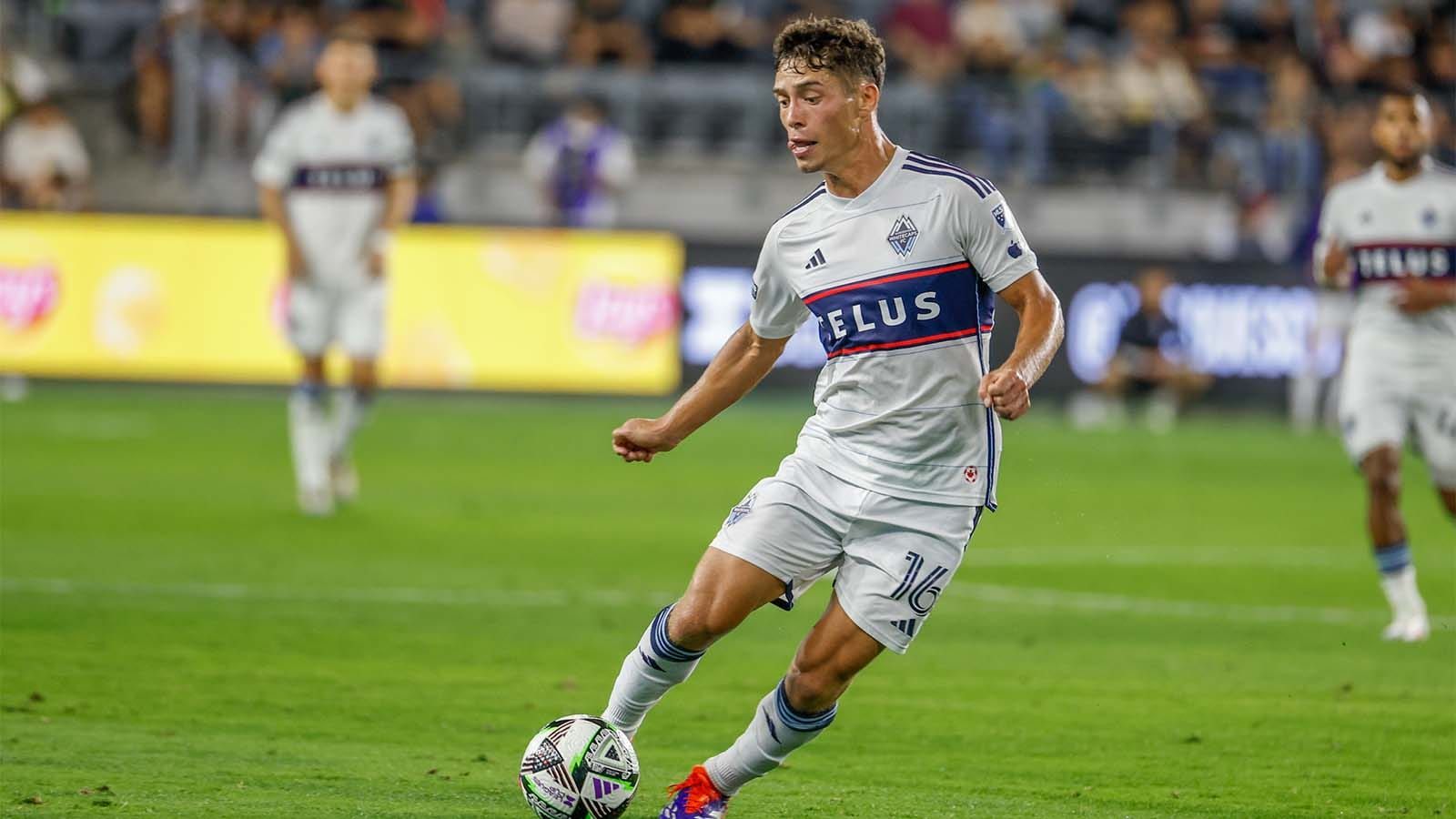Sebastian Berhalter of Vancouver Whitecaps kicking a ball