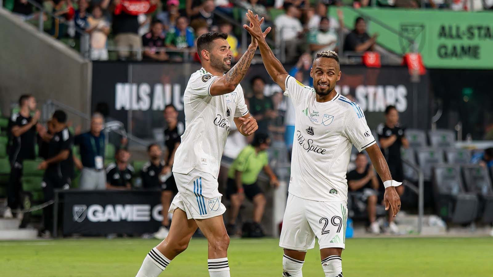 Tai Baribo and Hany Mukhtar high-fiving at 2025 All-Star Game