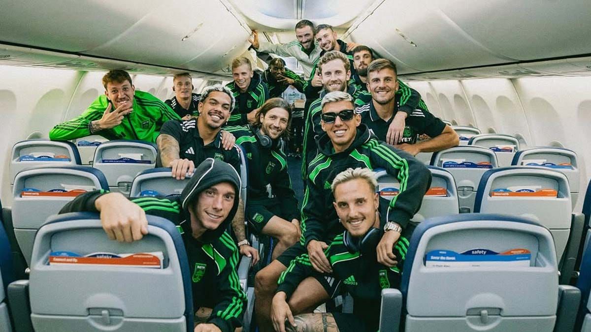 Austin FC players on a plane following their U.S. Open Cup semifinal win