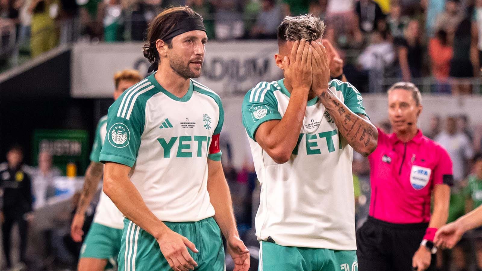 Myrto Uzuni reacts to missing a penalty kick