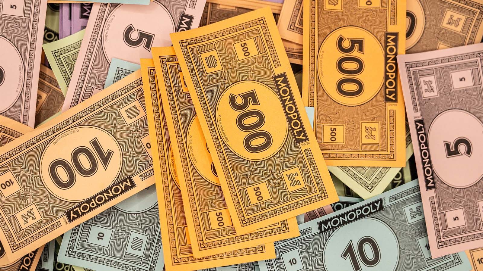 Monopoly money in various denominations (including $500 and $100) 
