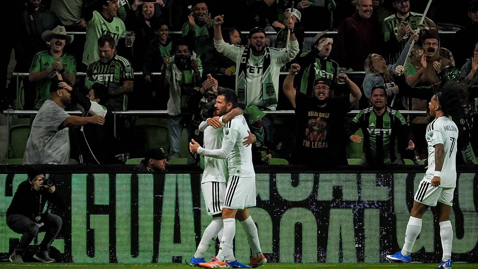Facundo Torres and Brendan Hines-Ike hugging after Austin's opening goal