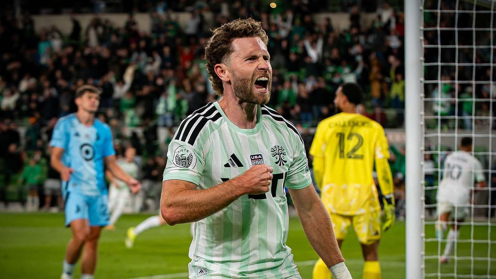 Jon Gallagher celebrating Myrto Uzuni's goal