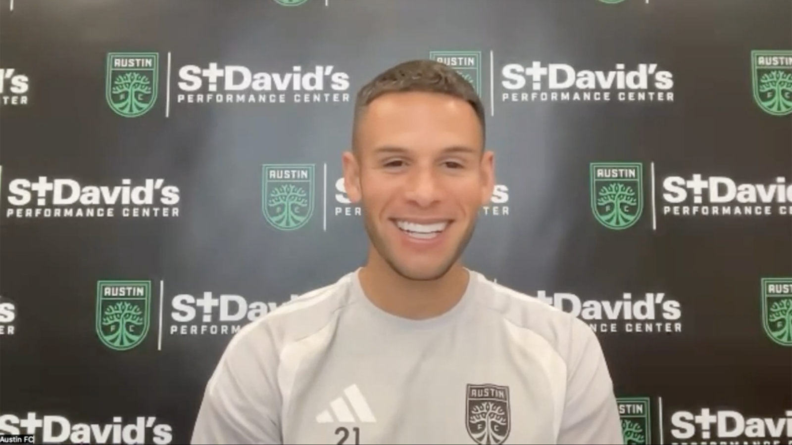 Christian Ramírez smiling in press conference video