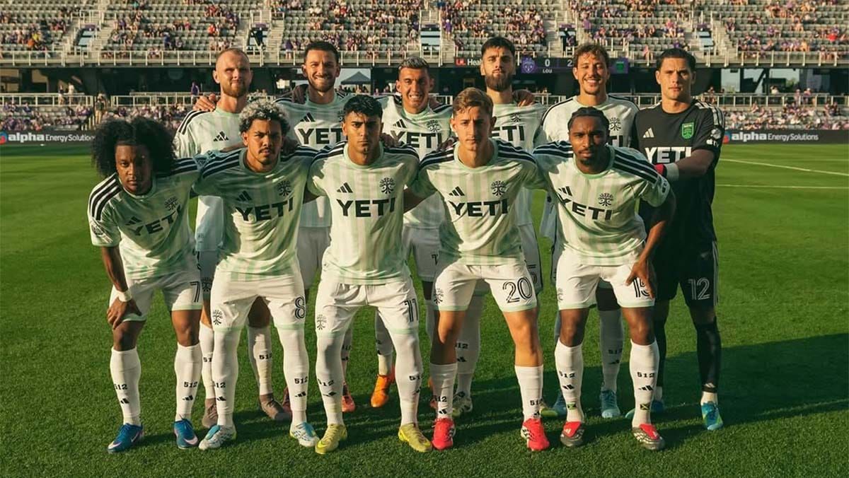 Austin FC players posing for group picture prior to Open Cup match against Louisville City