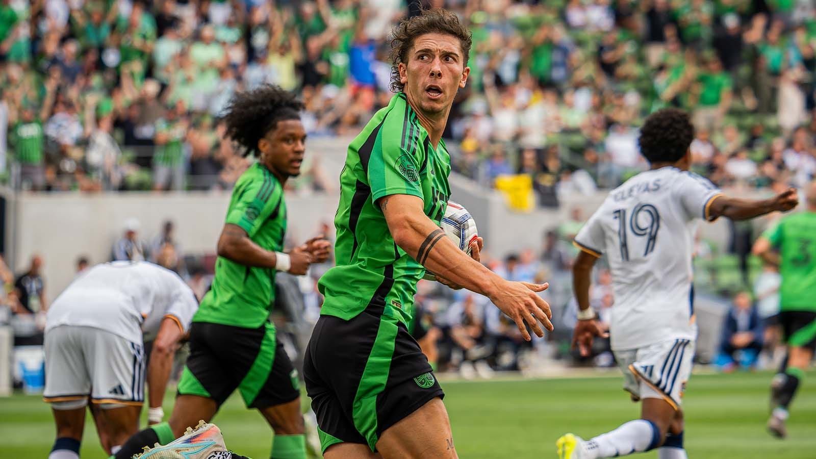 CJ Fodrey holding ball and running in match vs. LA Galaxy